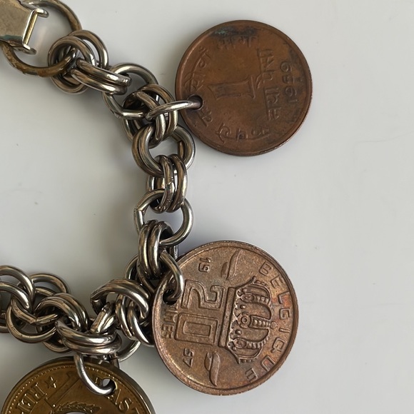 Vintage coin charm bracelet with various European coins on a silver tone chain - Picture 7 of 12